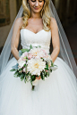 Modern + Romantic New York City Wedding : I’m not surprised that this beautiful Bride is an interior designer; she has quite an eye. With the gorgeous florals by Occasion 9 spread throughout Studio 405, this modern venue becomes uber romantic and the perf