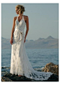 Lace Beach Halter Wedding Dress - http://casualweddingdresses.net/halter-wedding-dresses-are-such-a-hit-for-casual-weddings/