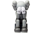 Kaws Companion Passing Through 2018: Complete Set of 3. New and sealed in their original packaging. 
The most iconic of the Kaws Companions presented in 3 color-ways. Published by Kaws One, these figurines have since sold out. Set includes 3 colors: