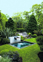 lush garden greenery with water feature in the Hamptons52354210