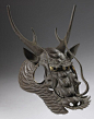 Baman (horse mask), attributed to Fukutake Ichiro (1928 - 2002) Japan, Showa period, 20th century Length: 24 1⁄2 inches, 62.5 cm Width: 15 3⁄4 inches, 40 cm An iron horse mask, bamen, in the form of a fierce dragon’s head, hammered in separate sections th