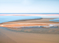 Lake Eyre / Kati Thanda : The Lake Eyre / Kati Thanda basin is one of the largest dry land river systems on our planet. With a size of about 10.000 km², it is Australias biggest and oldest lake and it´s also the lowest point of the continent.In 2019 a rar