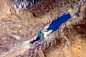 死海，地球上最低的湖泊，湖面海拔负422米，位于巴勒斯坦、以色列和不丹之间