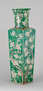 FAMILLE VERTE PORCELAIN VASE Kangxi Period   In rectangular form with prunus decoration on a green ground. Passionflower design at shoulder. Six-character Kangxi mark on base. Height 22 3/4" (57.5 cm).