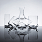 Faceted Crystal Glassware : The Viski Faceted Crystal Collection brings together the mathematical purity of 21st century design tools and the centuries old art of hand blown crystal to present a striking set of glassware for wine, whiskey and champagne.