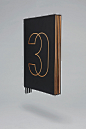 Copper foiled brochure for Four Seasons private residence 30 Park Place by Mother