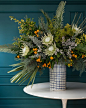 7 Unusual Winter Flower Arrangements—And Vases—That Are Perfect for the Holidays