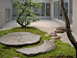 #landarch #peymim Credit: DK - Garden Design © 2009 Dorling Kindersley Limited Gravel and Stones In this contemporary courtyard, carefully chosen rocks and stones form a sculptural route across gravel and moss. The vertical lines of the trees offer a bala