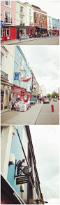 [Notting Hill Gate街景⑦] #鱼乐拍拍走##英伦爱之旅#太喜欢这条街了~正好赶上市集 各种有趣的招牌和小摊~更多精彩照片请进：