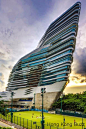 This building looks like something from a Sci-Fi movie!. It is designed by Pritzker-prize-winning architect Zaha Hadid.