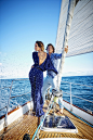 Glamorous couple standing on yacht deck by Gable Denims on 500px