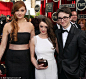 Isaac Hempstead-Wright went for a mature look as he posed with Game Of Thrones co-stars Sophie Turner and Maisie Williams at the 2014 SAG awards.