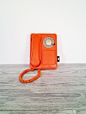This vintage rotary phone would be a great and unexpected splash of color.