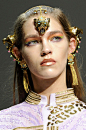 A model at Paris fashion week with Gazelle hair accessories and earrings from the Manish Arora Amrapali collection.