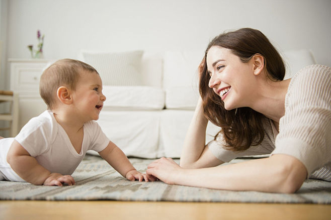 Mother and baby play...