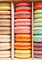 Macarons are shiny, domed French cookies made with ground almond, powdered sugar, and egg whites, sandwiched around a creamy filling (often buttercream). They come in a rainbow of colors and flavors.