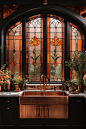 Regal Copper-Clad Kitchen with Stained Glass Elegance