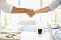 Business people shaking hands over conference table by Gable Denims on 500px