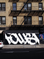 SoHo, New York 2014 : Graffiti mural on Lafayette and Prince Street in SoHo, New York.