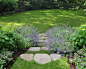 Design ideas for a mid-sized traditional partial sun hillside stone landscaping in Boston for summer.