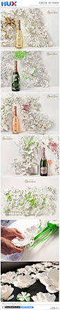 #MUX鉴赏# #广告创意#Jo Lynn Alcorn为著名的香槟Perrier Jouet设计的纸浮雕广告，让酒的文化内涵随着花雕的枝蔓四处延伸，算得上是商品和艺术完美结合。 http://t.cn/zW6H78s
