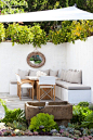 Garden nook with dining space and neutral pillows