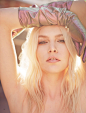 Getting her closeup, Aline Weber wears mid-length gloves