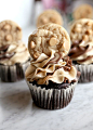 Peanut butter cookies, on a bed of Chocolate Peanut Butter Cupcakes