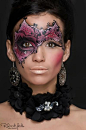 Creative purple and black crystal accented masquerade make-up mask