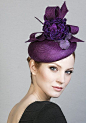 Purple parisisal straw pillbox with handmade silk flowers and bow