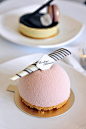 A domed light peach mousse with a sakura infused ... | Pâtisseries