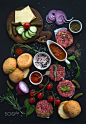 Ingredients for cooking burgers. Raw ground beef meat cutlets, buns, red onion, cherry tomatoes, gre by Anna Ivanova on 500px