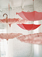 Adorable hanging pink umbrellas. Anne Robert Photography | annerobertphotography.com, Read more - http://www.stylemepretty.com/living/2013/06/14/pink-baby-shower-from-karson-butler-events-and-anne-robert-photography/