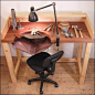 Work bench with leather catch tray.  great Idea for an indoor work bench