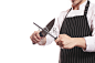 面目全非的厨师在磨刀图片-商业图片-正版原创图片下载购买-VEER图片库