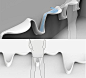 #工业设计#如果用洗手的水冲走小便的话，可以节省不少水。这款概念小便池将洗手盆和小便池无缝整合到一起，看上去像是一幅写意山水画，洗手盆位于高处，洗完手之后，水直接流到位于低处的小便池内，将残余的尿液冲走。既节省了水源，还可以就地解决洗手问题，省得小便之后转移到更远的洗手盆处洗手，并且大人小孩兼顾。一举多得。