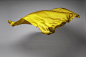 yellow flying fabric