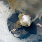 Erupting volcanoes photographed from space