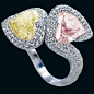 Toi & Moi ring set with a heart-shaped fancy intense yellow diamonds of 2.85 carats and heart-shaped fancy orangy pink diamond of 2.10 carats by Chopard