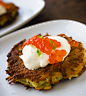 It’s the last night of Chanukah, so it’s definitely okay to eat latkes for lunch and for dinner. 
At Russ & Daughters, we make our potato latkes by hand, and topped here with creme fraiche and wild Alaskan salmon roe. (For dinner later I might choose 