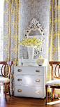 The mirror, the dresser, those drapes, that wallpaper! The combo is so chic and so bright!