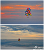 #世相视角#：【美国男子“飞屋环游” 挑战飞越大西洋】当地时间9月12日，美国缅因州，挑战者乔纳森-特拉普利用370个大型气球，将和他乘坐的小艇一起飞越过大西洋。如果乔纳森成功完成此举，将成为首个利用集群气球飞跃大西洋的人，全部行程大约2500英里。http://t.cn/z8pYAYD