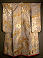 Either the front or back of a garment can be displayed--depending upon its ornamentation. The backs of dramatic wedding kimono are usually displayed, most often with the front panels spread to show the full width and continuous design of these pieces. The