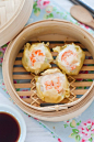 Prawn and Scallop  Shumai300g  of scallops 225g of prawns (keep 10 prawns for garnishing the shumai afterwards) 1 pack of shumai pastry (available from Chinese supermarket) 1 spring onion 1 teaspoon sea salt ¼ teaspoon pepper powder Couple drops of sesame