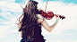 ID-929065-拉小提琴家的欧美女孩高清大图