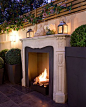 Outdoor fireplace- this is just gorgeous