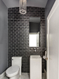 Small contemporary gray tile, black tile, white tile and subway tile mosaic tile floor powder room idea in Toronto with a pedestal sink, a two-piece toilet and gray walls