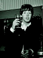 Paul McCartney with a glass of wine