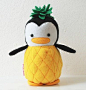 Why is this penguin dressed like a pineapple? Who cares, look how cute!