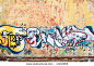 Abstract graffiti on the wall - urban background photo - stock photo